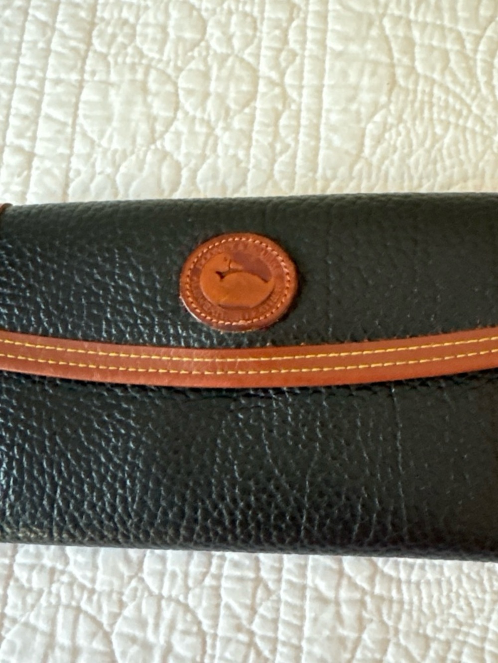 Dooney & Bourke Black and Brown Pebbled Leather Wallet